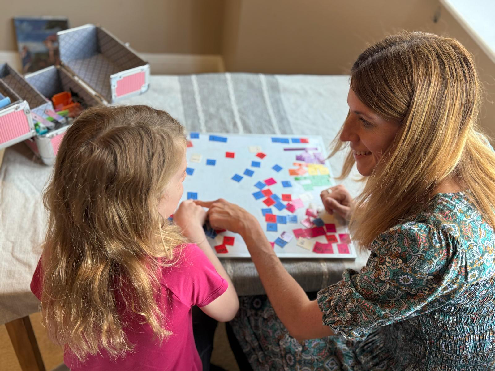 Rosie Quayle working with a child in a therapy session